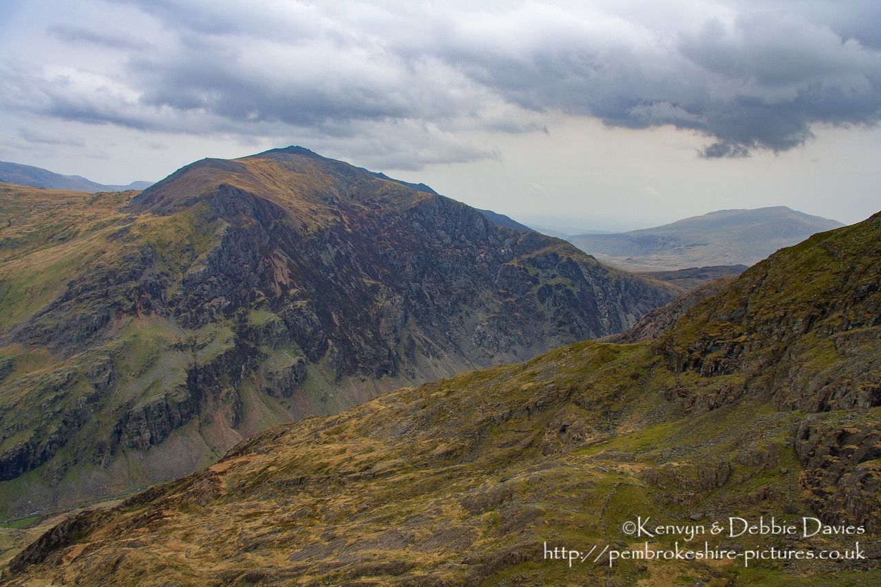 View from about three quarters of the way up Snowdon, the highest the rack & pinion railway (the only on in the UK) was going at the time. Weather discouraged climbing to the top....