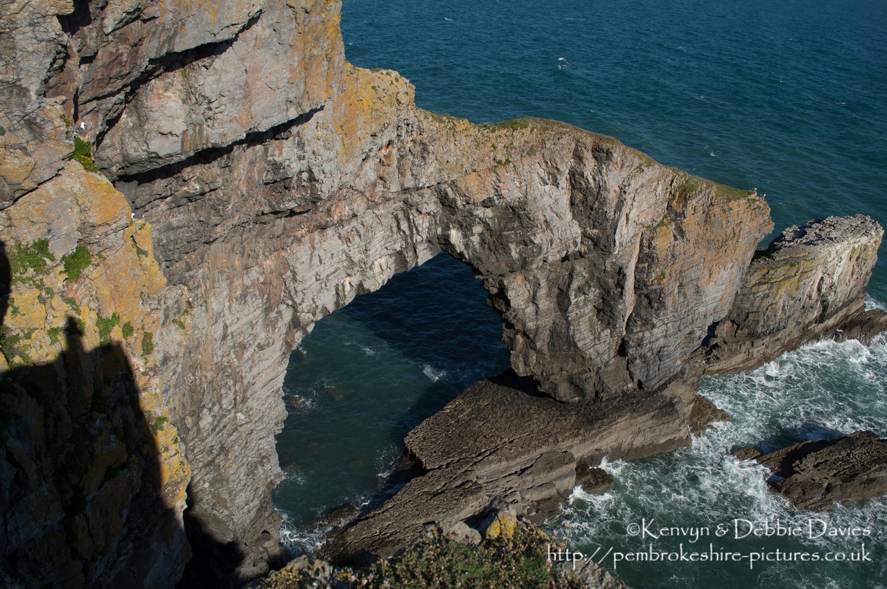 The Green Bridge of Wales is one of the most famous landmarks in Wales, and one of the most spectacular sites on the Pembrokeshire Coast. It is located close to Castlemartin in the south of the county, and is adjacent to the Stack Rocks and the Cauldron.
