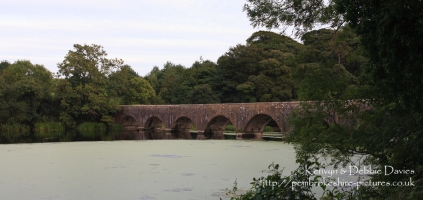 The eight arch bridge at Stackpole Court was built in 1797 to connect the mansi...